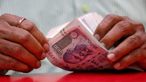 Rupee falls 28 paise to close at 87.46 against U.S. dollar